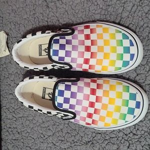 Slip on rainbow checkered Vans